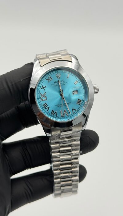 Aqua Blue Dial Silver Watch – Roman Numerals & Jubilee Bracelet