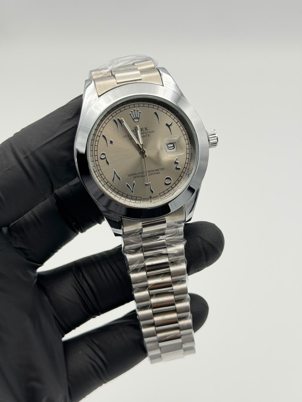 Champagne Dial Silver Watch – Arabic Numerals & Jubilee Bracelet