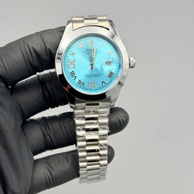 Aqua Blue Dial Silver Watch – Roman Numerals & Jubilee Bracelet